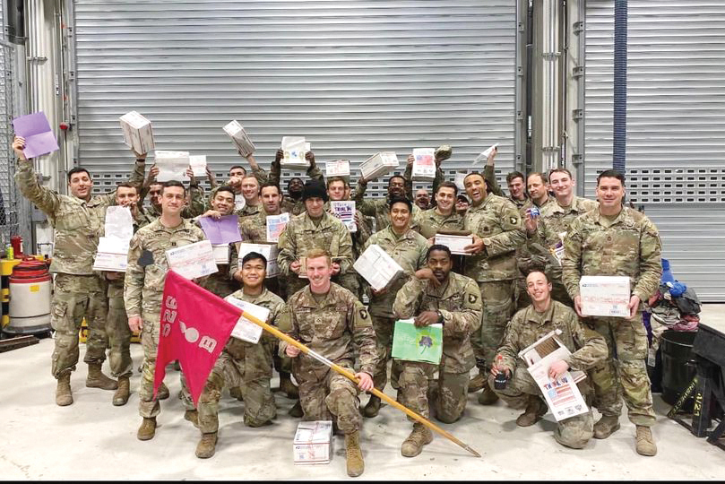 Troops with their care packages from Local 440