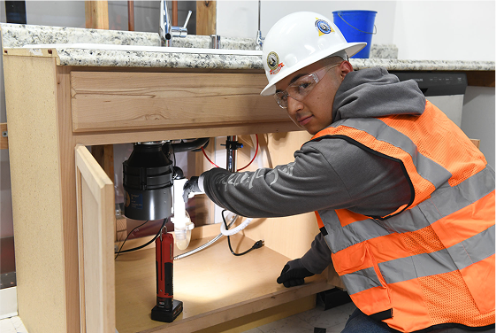 UA Apprentice Fixing Sink | Registered Apprenticeship Program | United Association